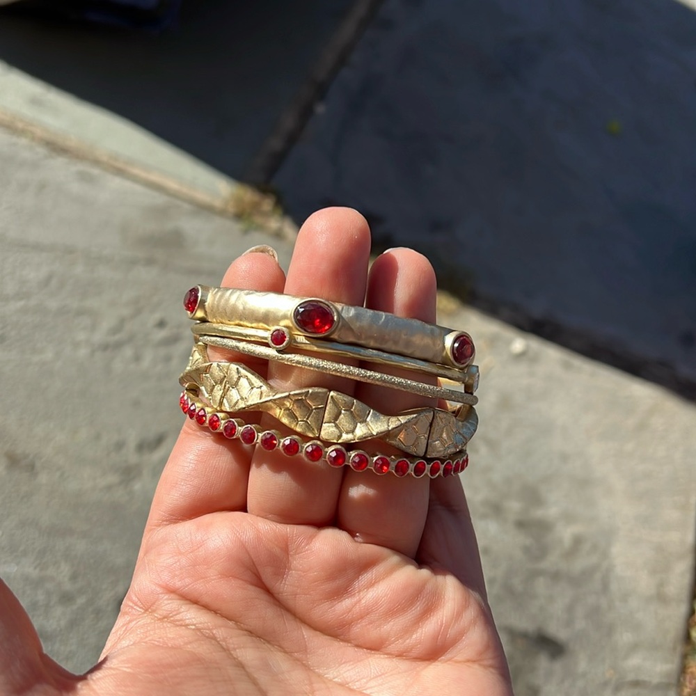 Lia Sophia gold with red gem stacking bracelets